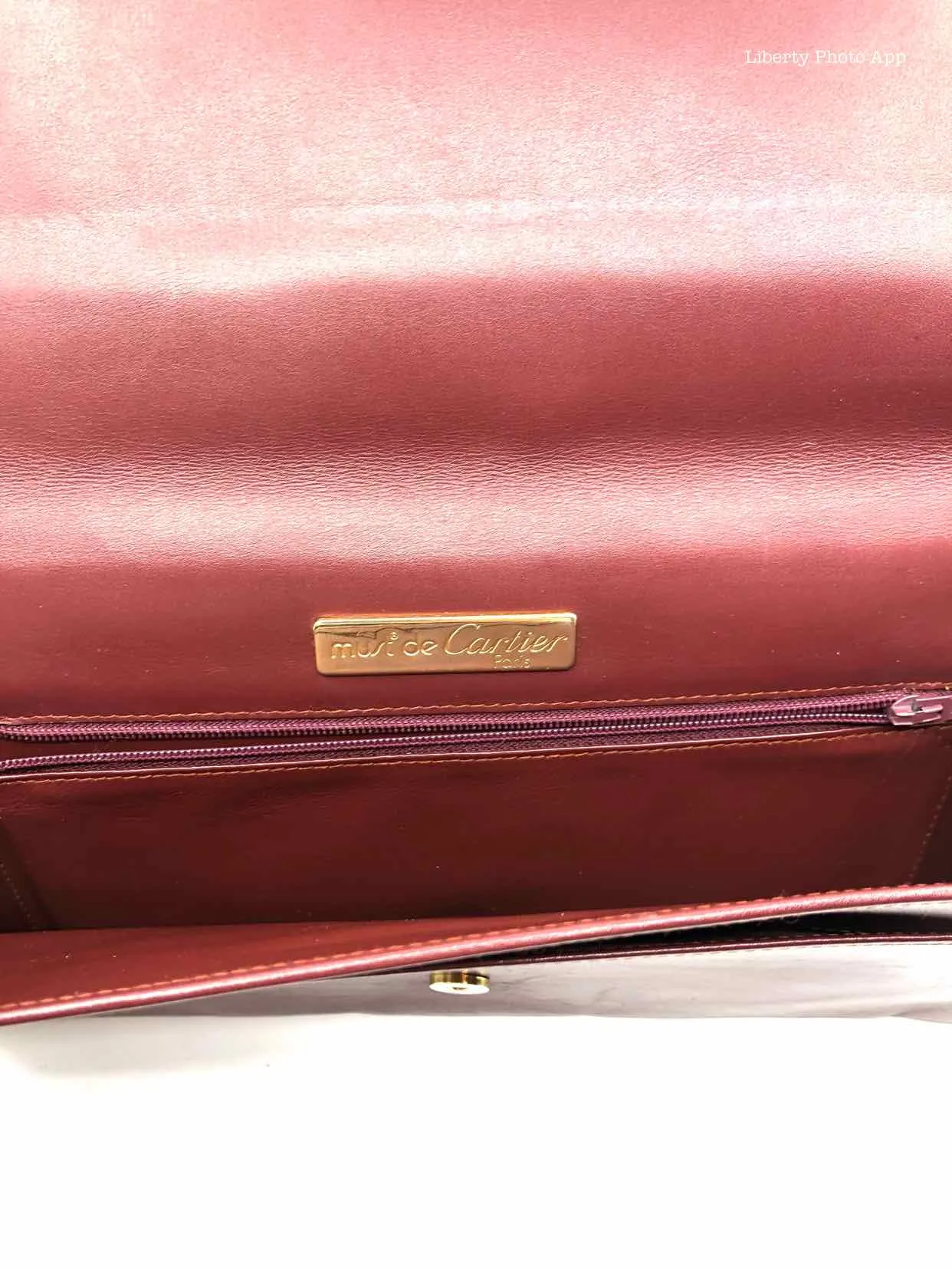 CARTIER Maroon Solid Clutch