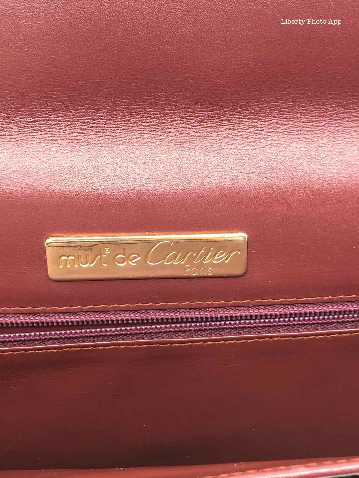 CARTIER Maroon Solid Clutch