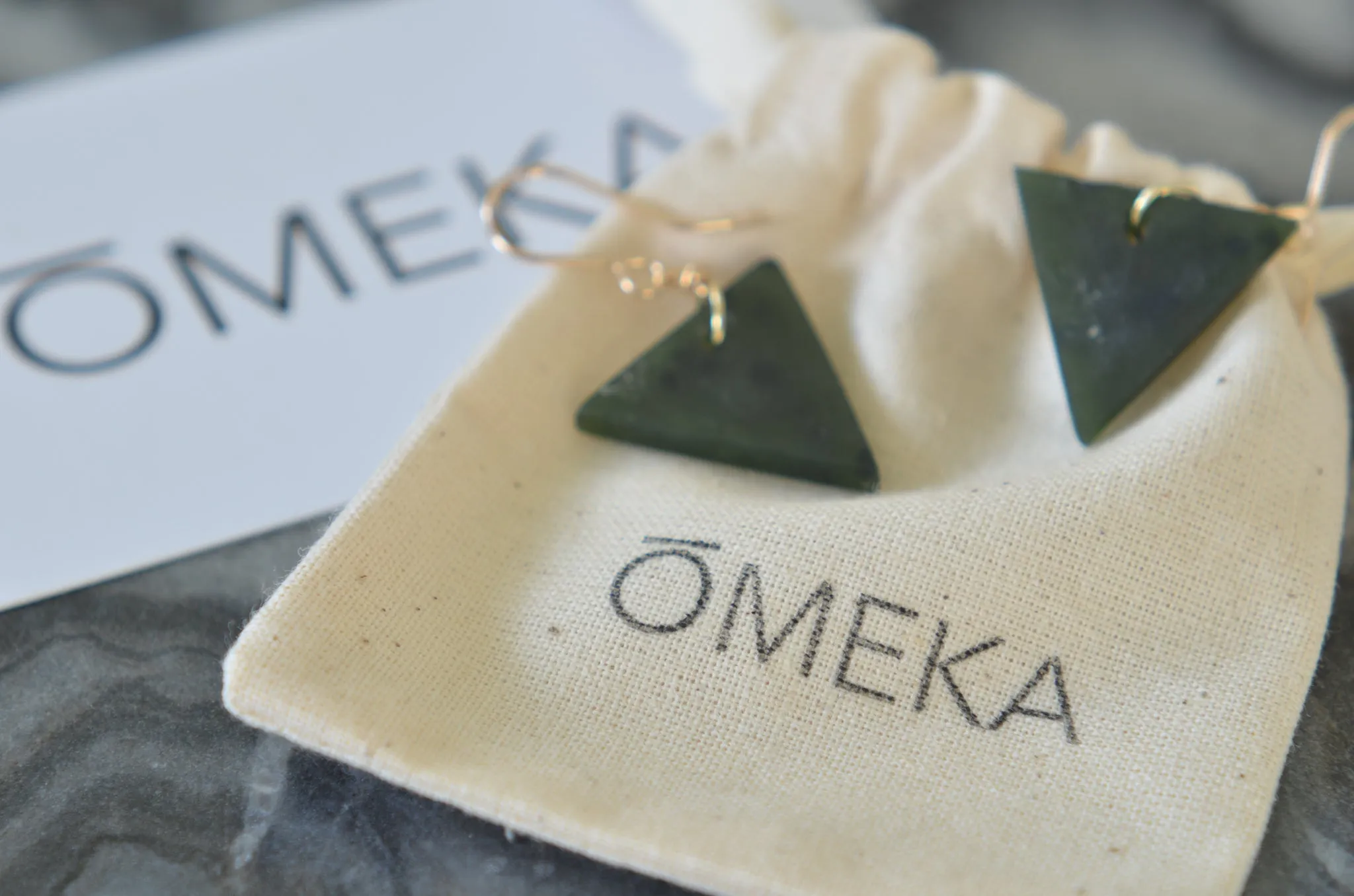 ŌMEKA Pounamu Niho in 9ct Gold Chain