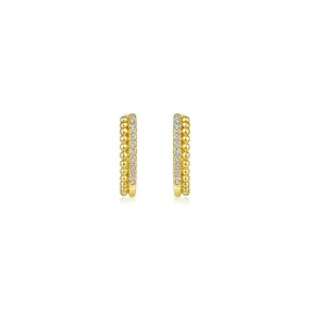 Pave Diamond Huggie Hoops in Yellow Gold