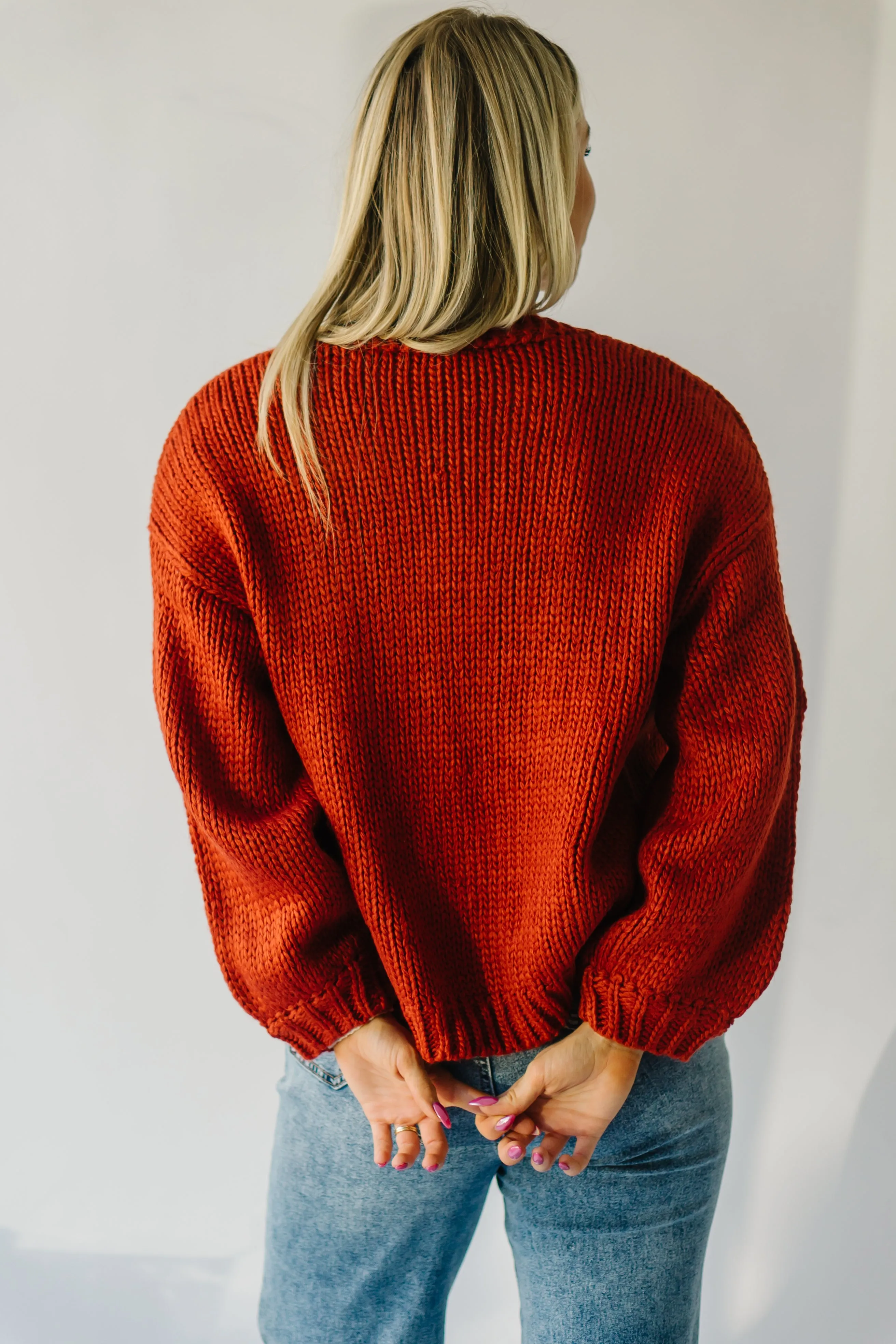 The Adara Knit Daisy Detail Cardigan in Rust